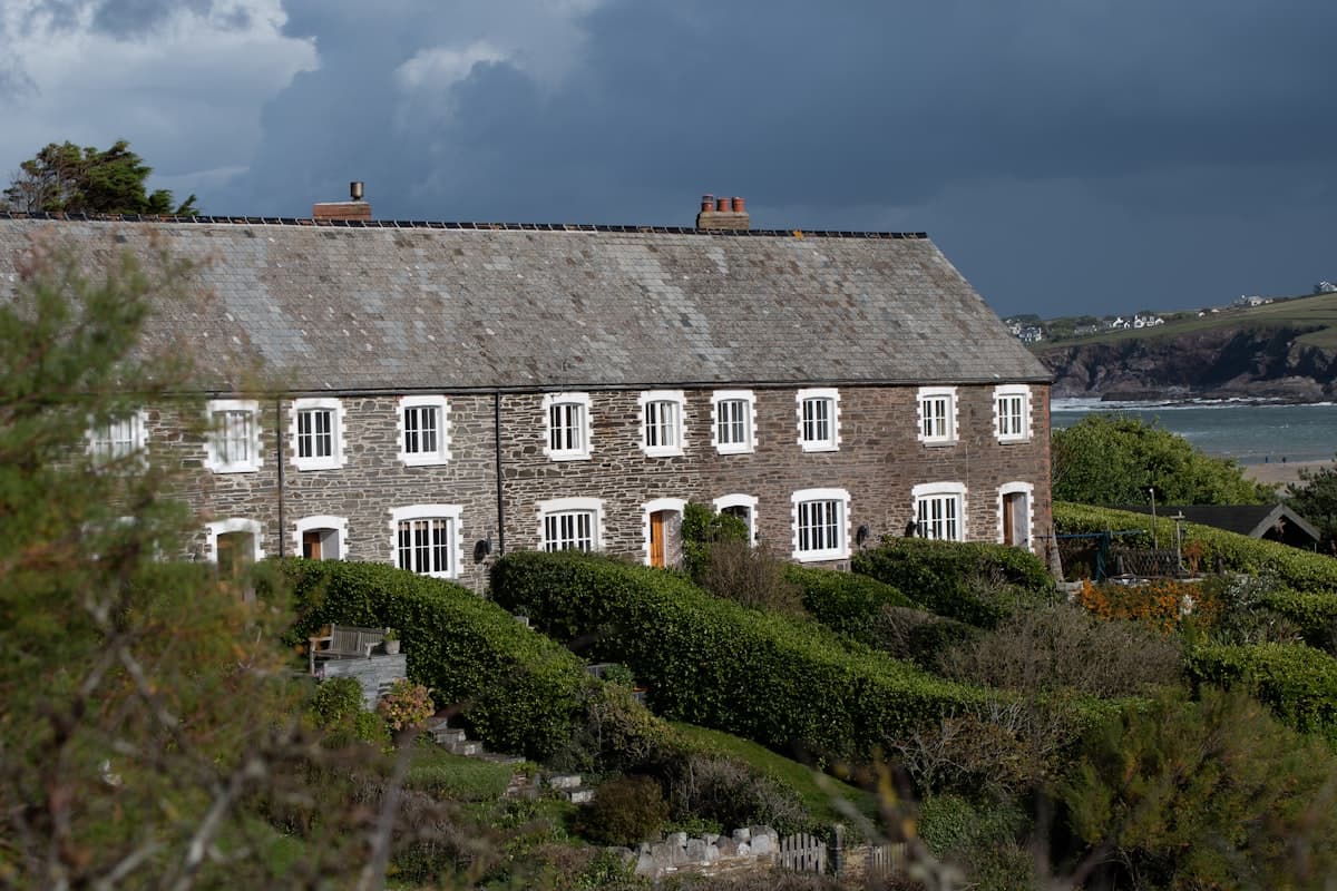 Stone cottages overlooking the sea in Cornwall